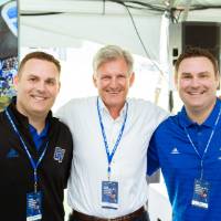 Randy Damstra posing with guests at the Jamie Hosford Football Center dedication.